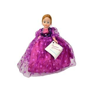 Madame Alexander restrung 10" Portrettes Belle of the Ball doll with stand.